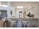 Breakfast bar with granite countertop and seating for three at 11166 E Prospect Point Dr, Scottsdale, AZ 85262