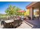 Outdoor seating area with mountain views and red umbrella at 11166 E Prospect Point Dr, Scottsdale, AZ 85262