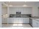 Modern kitchen with granite countertops, stainless steel appliances, and ample cabinetry at 11166 E Prospect Point Dr, Scottsdale, AZ 85262
