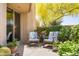 Relaxing patio with comfortable seating, lush landscaping, and a tranquil atmosphere at 11166 E Prospect Point Dr, Scottsdale, AZ 85262