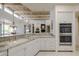 Spacious kitchen featuring granite countertops, stainless steel appliances, and white cabinetry at 11166 E Prospect Point Dr, Scottsdale, AZ 85262