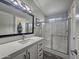 Bathroom with white vanity, walk-in shower, and gray floor at 650 N Hawes Rd # 4409, Mesa, AZ 85207