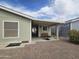 Covered patio with brick pavers and seating area at 650 N Hawes Rd # 4409, Mesa, AZ 85207