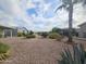 Landscaped community with desert plants and homes at 650 N Hawes Rd # 4409, Mesa, AZ 85207