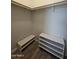 Walk-in closet with shelving and bench at 650 N Hawes Rd # 4409, Mesa, AZ 85207