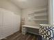 Small bedroom with desk, shelving and twin bed at 650 N Hawes Rd # 4409, Mesa, AZ 85207