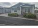 Exterior view of a manufactured home with gray and beige siding at 650 N Hawes Rd # 4409, Mesa, AZ 85207