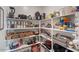 Well-organized pantry with ample shelving for food storage at 269 S 190Th Dr, Buckeye, AZ 85326