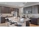 Spacious kitchen with granite countertops, stainless steel appliances, and an island at 269 S 190Th Dr, Buckeye, AZ 85326