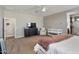 Bright bedroom with a king-size bed, TV, and plenty of space at 269 S 190Th Dr, Buckeye, AZ 85326