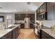Eat-in kitchen with stainless steel appliances and granite countertops at 269 S 190Th Dr, Buckeye, AZ 85326
