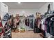 Large walk-in closet with ample shelving and hanging space at 269 S 190Th Dr, Buckeye, AZ 85326
