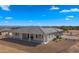 Single story home with covered patio and desert landscape at 29811 N 154Th St, Scottsdale, AZ 85262