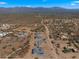 Aerial view of a new home community with desert landscape and mountain views at 29811 N 154Th St, Scottsdale, AZ 85262