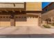 Attached two-car garage with stone accents at 1350 S Greenfield S Rd # 1081, Mesa, AZ 85206