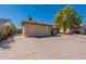 Single story home with a two-car garage and a long driveway at 16410 S 46Th Pl, Phoenix, AZ 85048