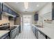 Updated kitchen featuring stainless steel appliances and ample cabinet space at 16410 S 46Th Pl, Phoenix, AZ 85048