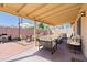 Covered patio with seating area, perfect for outdoor dining and relaxation at 16410 S 46Th Pl, Phoenix, AZ 85048