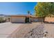 Single story home with a two-car garage and a well-manicured front yard at 16410 S 46Th Pl, Phoenix, AZ 85048