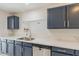 Kitchen with double sink, dishwasher, and modern cabinetry at 16410 S 46Th Pl, Phoenix, AZ 85048