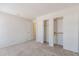 Spacious bedroom with double closets and neutral carpeting at 16410 S 46Th Pl, Phoenix, AZ 85048