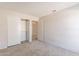 Bedroom with double closets and access to hallway at 16410 S 46Th Pl, Phoenix, AZ 85048