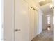 Home hallway with carpet flooring and access to bedrooms at 16410 S 46Th Pl, Phoenix, AZ 85048