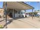 Home exterior with carport, landscaping, and steps at 2233 E Behrend Dr # 210, Phoenix, AZ 85024