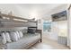 Cozy bedroom with a bunk bed, ample pillows, and a TV at 2233 E Behrend Dr # 210, Phoenix, AZ 85024