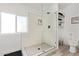 Updated bathroom featuring a large walk-in shower and modern fixtures at 2233 E Behrend Dr # 210, Phoenix, AZ 85024