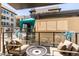 Private patio with fire pit and seating area at 7300 E Earll Dr # 1012, Scottsdale, AZ 85251