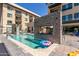 Relaxing community pool with a patriotic floatie at 7300 E Earll Dr # 1012, Scottsdale, AZ 85251