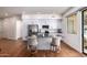 Modern kitchen with island, white cabinets, and stainless steel appliances at 7300 E Earll Dr # 1012, Scottsdale, AZ 85251