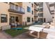 Courtyard recreation area with ping pong and cornhole at 7300 E Earll Dr # 1012, Scottsdale, AZ 85251