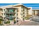 Modern apartment building with parking and landscaping at 7300 E Earll Dr # 1012, Scottsdale, AZ 85251