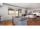 Modern kitchen island with sink and breakfast bar at 7300 E Earll Dr # 1012, Scottsdale, AZ 85251