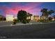 Stunning modern home with a large driveway and mature landscaping at 24351 N 97Th Dr, Peoria, AZ 85383