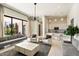 Open living area with comfortable seating and kitchenette at 24351 N 97Th Dr, Peoria, AZ 85383