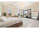 Main bedroom with stunning backyard views and a large walk-in closet at 24351 N 97Th Dr, Peoria, AZ 85383