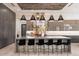 Gourmet kitchen with large island, stainless steel appliances, and modern cabinetry at 24351 N 97Th Dr, Peoria, AZ 85383