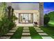 Outdoor patio with artificial turf and seating area at 24351 N 97Th Dr, Peoria, AZ 85383