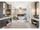 Spa-like bathroom with freestanding tub, walk-in shower, and dual vanities at 24351 N 97Th Dr, Peoria, AZ 85383