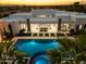 Luxury home featuring a large pool, spa, and expansive backyard at 24351 N 97Th Dr, Peoria, AZ 85383