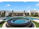 Stunning pool and spa with a circular spa, surrounded by a spacious patio at 24351 N 97Th Dr, Peoria, AZ 85383