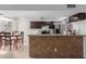 Bright kitchen with granite countertops and dark brown cabinetry at 3837 W Dailey St, Phoenix, AZ 85053