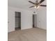 Bright bedroom with neutral carpeting and ceiling fan at 3837 W Dailey St, Phoenix, AZ 85053