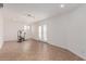 Bright exercise room with tiled floors and access to backyard at 3837 W Dailey St, Phoenix, AZ 85053
