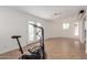 Spacious exercise room with tiled floors and plenty of natural light at 3837 W Dailey St, Phoenix, AZ 85053