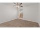 Well-lit bedroom featuring a ceiling fan and window at 3837 W Dailey St, Phoenix, AZ 85053