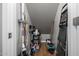 Small storage room with cleaning supplies and a step ladder at 42999 W Samuel Dr, Maricopa, AZ 85138